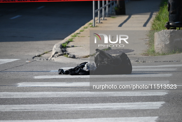 An unidentified adult man is shot multiple times and killed in a shooting on the 400 block of W. Cermak Road in Chicago, Illinois, United St...