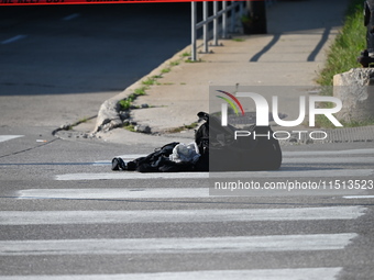 An unidentified adult man is shot multiple times and killed in a shooting on the 400 block of W. Cermak Road in Chicago, Illinois, United St...