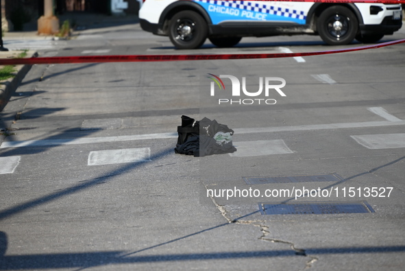 An unidentified adult man is shot multiple times and killed in a shooting on the 400 block of W. Cermak Road in Chicago, Illinois, United St...