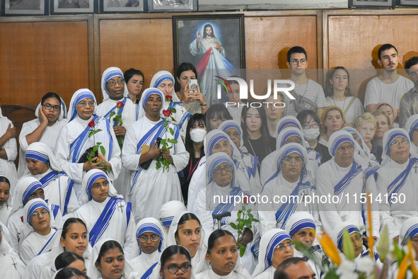 People and sisters of Missionaries of Charity participate in prayer on the occasion of the birthday of Saint Teresa at Mother House in Kolka...