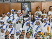 People and sisters of Missionaries of Charity participate in prayer on the occasion of the birthday of Saint Teresa at Mother House in Kolka...