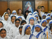 People and sisters of Missionaries of Charity participate in prayer on the occasion of the birthday of Saint Teresa at Mother House in Kolka...