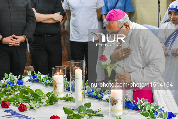 The archbishop of Kolkata prays in front of Saint Teresa's tomb on the occasion of Saint Teresa's birthday at Mother House in Kolkata, India...