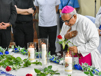 The archbishop of Kolkata prays in front of Saint Teresa's tomb on the occasion of Saint Teresa's birthday at Mother House in Kolkata, India...