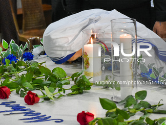 A sister of Missionaries of Charity prays in front of Saint Teresa's tomb on the occasion of Saint Teresa's birthday at Mother House in Kolk...