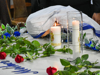 A sister of Missionaries of Charity prays in front of Saint Teresa's tomb on the occasion of Saint Teresa's birthday at Mother House in Kolk...