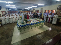 People and sisters of Missionaries of Charity participate in prayer on the occasion of the birthday of Saint Teresa at Mother House in Kolka...