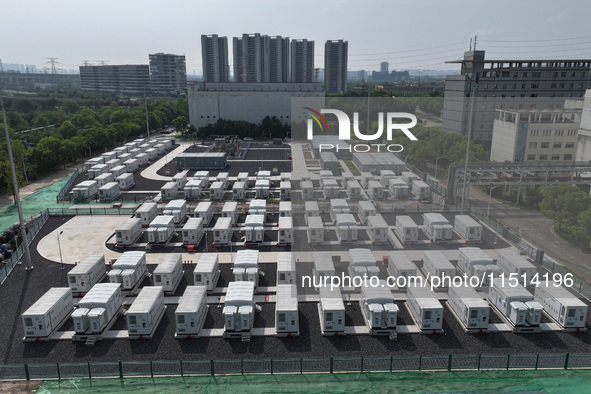 An aerial photo shows an energy storage power station on the side of Banqiao grid in Nanjing, China, on August 26, 2024. The power station i...