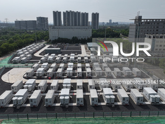 An aerial photo shows an energy storage power station on the side of Banqiao grid in Nanjing, China, on August 26, 2024. The power station i...