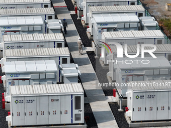 An aerial photo shows an energy storage power station on the side of Banqiao grid in Nanjing, China, on August 26, 2024. The power station i...