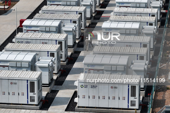 An aerial photo shows an energy storage power station on the side of Banqiao grid in Nanjing, China, on August 26, 2024. The power station i...