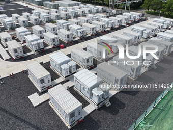 An aerial photo shows an energy storage power station on the side of Banqiao grid in Nanjing, China, on August 26, 2024. The power station i...