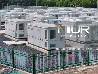 An aerial photo shows an energy storage power station on the side of Banqiao grid in Nanjing, China, on August 26, 2024. The power station i...