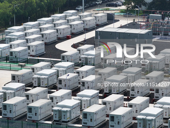 An aerial photo shows an energy storage power station on the side of Banqiao grid in Nanjing, China, on August 26, 2024. The power station i...