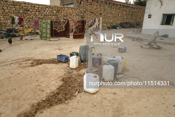 Plastic jerry cans filled with drinking water in a house in a rural area in Kairouan, Tunisia, on May 6, 2024. As the region faces water str...