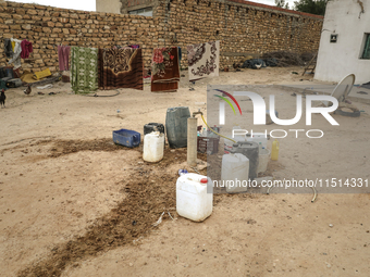 Plastic jerry cans filled with drinking water in a house in a rural area in Kairouan, Tunisia, on May 6, 2024. As the region faces water str...