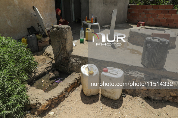 Plastic jerry cans filled with drinking water in a house in a rural area in Kairouan, Tunisia, on May 6, 2024. As the region faces water str...