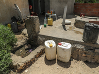 Plastic jerry cans filled with drinking water in a house in a rural area in Kairouan, Tunisia, on May 6, 2024. As the region faces water str...