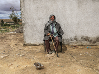 An old Tunisian man poses for photos in a rural area in Kairouan, Tunisia, on May 8, 2024. (