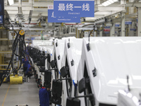 A worker works on an automobile production line at BYD Industrial Co LTD in Huai'an, China, on August 26, 2024. (