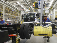 A worker works on an automobile production line at BYD Industrial Co LTD in Huai'an, China, on August 26, 2024. (