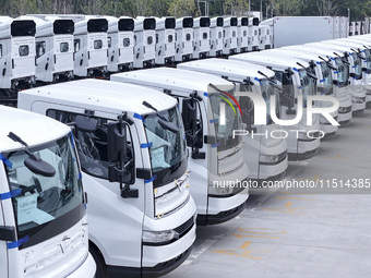 New energy commercial vehicles are produced by BYD Industrial Co., Ltd. in Huai'an, China, on August 26, 2024. (