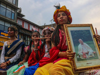 Hindu devotees celebrate the Janmashtami festival that marks the birthday of the Hindu god Krishna with a procession in Srinagar, Jammu and...