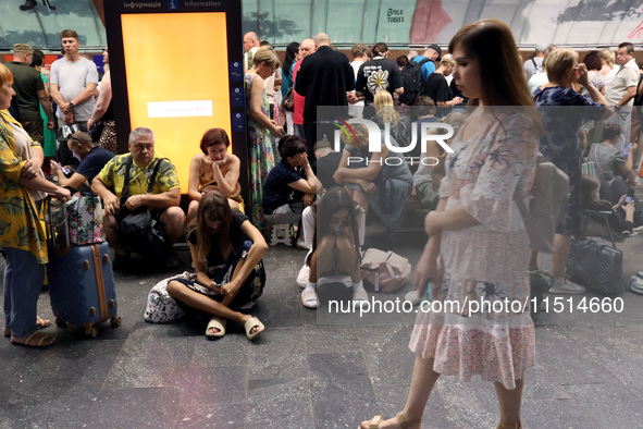 People shelter at the Osokorky metro station during the massive Russian drone and missile attack in Kyiv, Ukraine, on August 26, 2024. NO US...