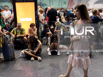 People shelter at the Osokorky metro station during the massive Russian drone and missile attack in Kyiv, Ukraine, on August 26, 2024. NO US...