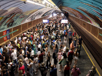 People shelter at the Osokorky metro station during the massive Russian drone and missile attack in Kyiv, Ukraine, on August 26, 2024. NO US...