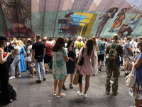 People shelter at the Osokorky metro station during the massive Russian drone and missile attack in Kyiv, Ukraine, on August 26, 2024. NO US...