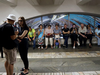 People shelter at the Osokorky metro station during the massive Russian drone and missile attack in Kyiv, Ukraine, on August 26, 2024. NO US...