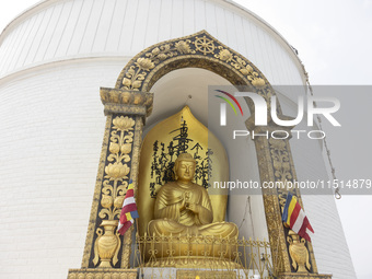 Shanti Stupa in Pokhara known as World Peace Pagoda with religious pilgrims and visitors, is a Buddhist monument situated at the height of 1...