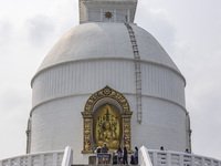 Shanti Stupa in Pokhara known as World Peace Pagoda with religious pilgrims and visitors, is a Buddhist monument situated at the height of 1...