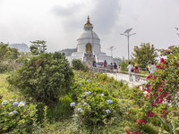 Shanti Stupa in Pokhara known as World Peace Pagoda with religious pilgrims and visitors, is a Buddhist monument situated at the height of 1...