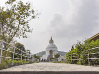 Shanti Stupa in Pokhara known as World Peace Pagoda with religious pilgrims and visitors, is a Buddhist monument situated at the height of 1...