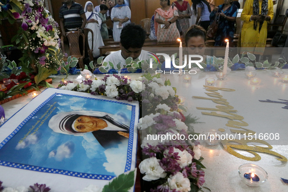 Devotees of the order founded by Saint Teresa pray by the tomb of Saint Teresa to mark her birth anniversary in Kolkata, India, on August 26...