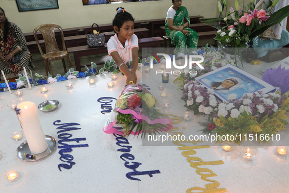 Devotees of the order founded by Saint Teresa pray by the tomb of Saint Teresa to mark her birth anniversary in Kolkata, India, on August 26...