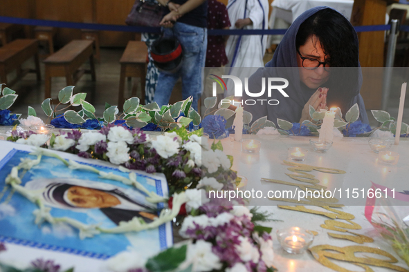 Devotees of the order founded by Saint Teresa pray by the tomb of Saint Teresa to mark her birth anniversary in Kolkata, India, on August 26...