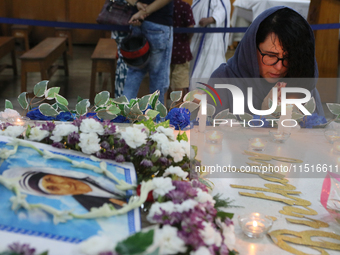 Devotees of the order founded by Saint Teresa pray by the tomb of Saint Teresa to mark her birth anniversary in Kolkata, India, on August 26...