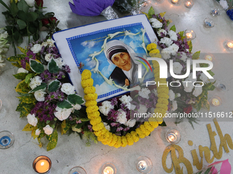 Devotees of the order founded by Saint Teresa pray by the tomb of Saint Teresa to mark her birth anniversary in Kolkata, India, on August 26...