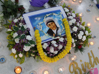 Devotees of the order founded by Saint Teresa pray by the tomb of Saint Teresa to mark her birth anniversary in Kolkata, India, on August 26...