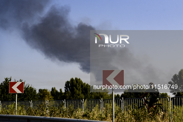 Smoke rises from the city's outskirts during a Russian missile and drone strike on Ukraine in Kyiv, Ukraine, on August 26, 2024. 