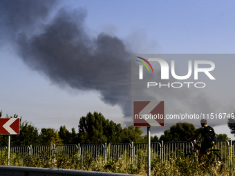 Smoke rises from the city's outskirts during a Russian missile and drone strike on Ukraine in Kyiv, Ukraine, on August 26, 2024. (