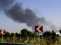 Smoke rises from the city's outskirts during a Russian missile and drone strike on Ukraine in Kyiv, Ukraine, on August 26, 2024. (