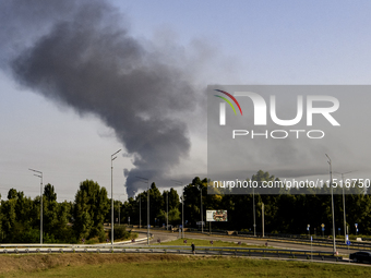 Smoke rises from the city's outskirts during a Russian missile and drone strike on Ukraine in Kyiv, Ukraine, on August 26, 2024. (