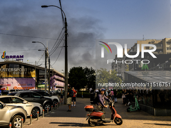 Smoke rises from the city's outskirts during a Russian missile and drone strike on Ukraine in Kyiv, Ukraine, on August 26, 2024. (