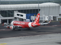 Air Asia low-cost commercial planes dock at Kuala Lumpur International Airport Terminal in Kuala Lumpur, Malaysia, on June 8, 2019. (