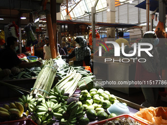 A survey of essential goods prices for the fasting month takes place at Chow Kit Market in Kuala Lumpur, Malaysia, on April 20, 2021. (