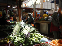 A survey of essential goods prices for the fasting month takes place at Chow Kit Market in Kuala Lumpur, Malaysia, on April 20, 2021. (